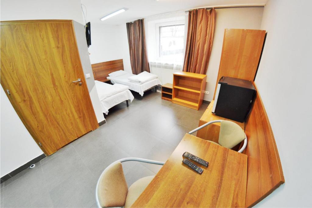 Postel nebo postele na pokoji v ubytování Twój Hostel Klimczoka 7