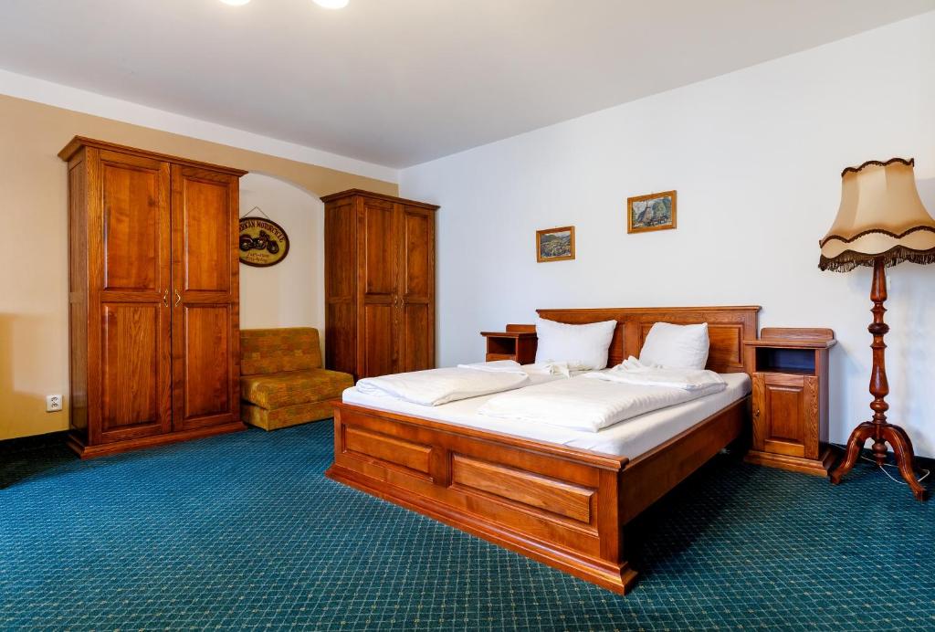 Postel nebo postele na pokoji v ubytování Penzion a Apartmány Daro