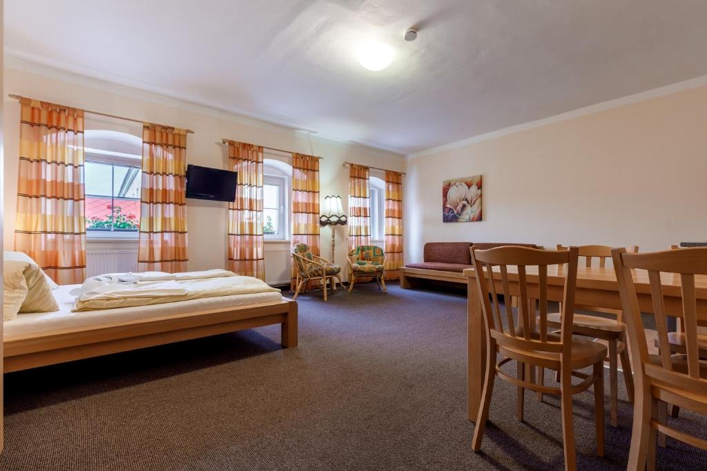 Postel nebo postele na pokoji v ubytování Penzion a Apartmány Daro