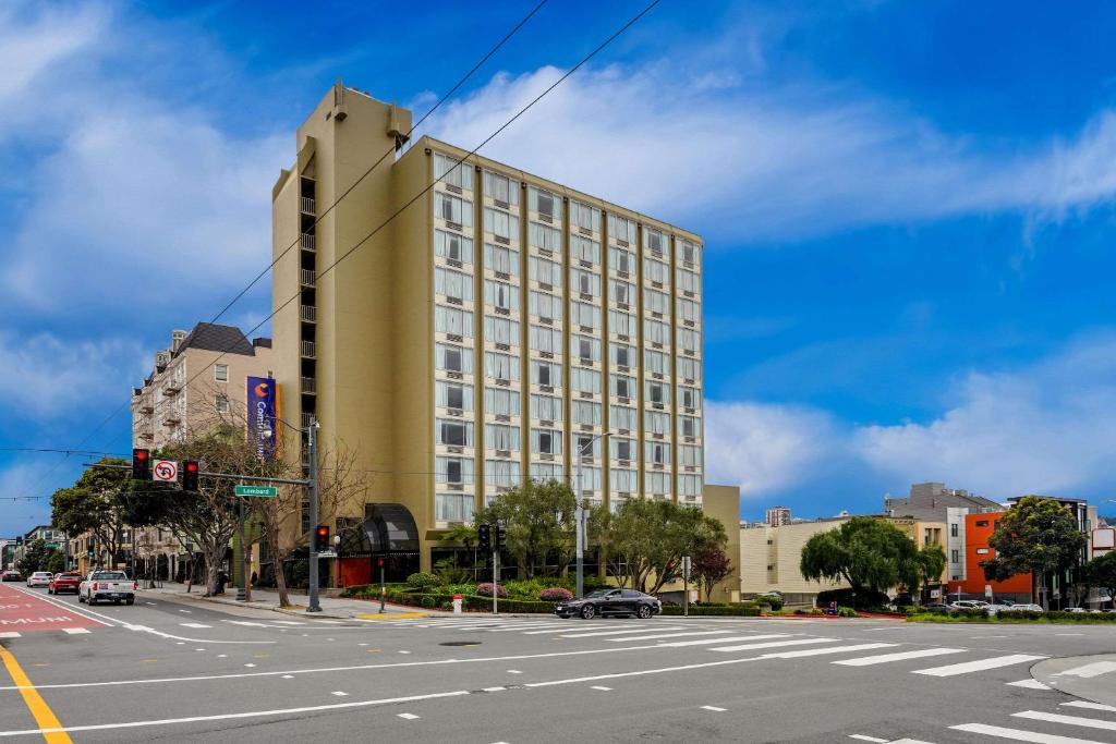 a tall building on a city street with a road at Comfort Inn By the Bay in San Francisco