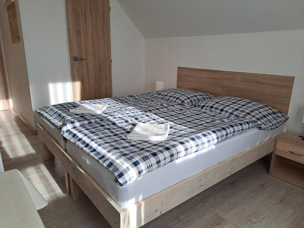 Postel nebo postele na pokoji v ubytování Apartmány Amália