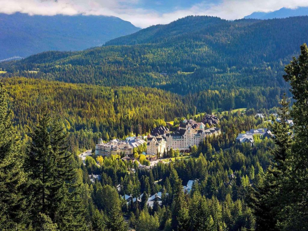 an aerial view of a resort in the mountains at Fairmont Chateau Whistler in Whistler