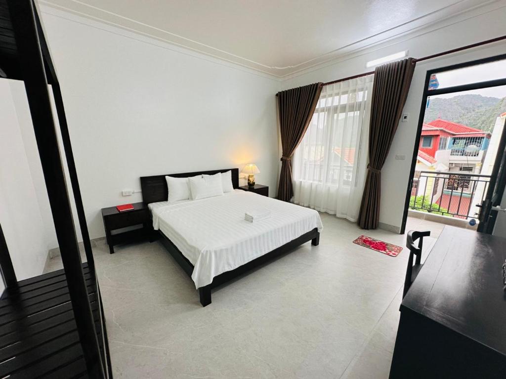 Postel nebo postele na pokoji v ubytování Tam Cốc LullaBy Homestay