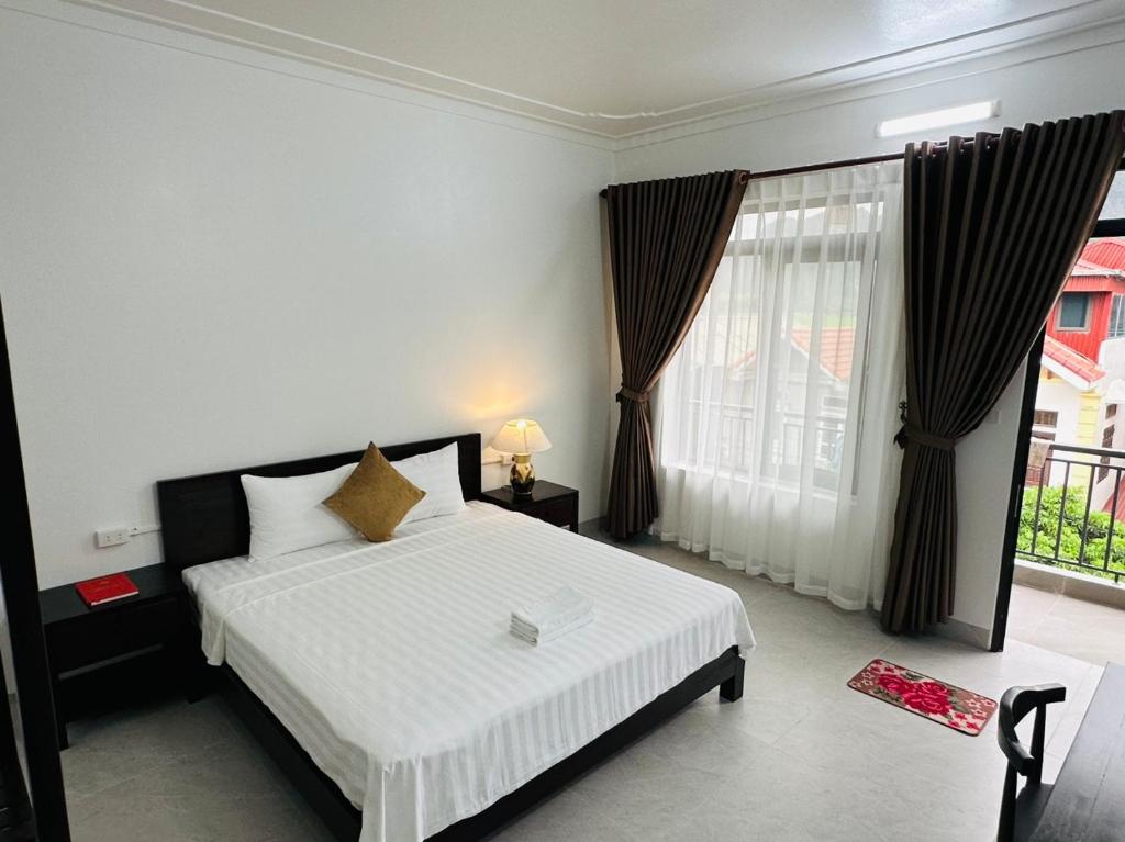 Postel nebo postele na pokoji v ubytování Tam Cốc LullaBy Homestay