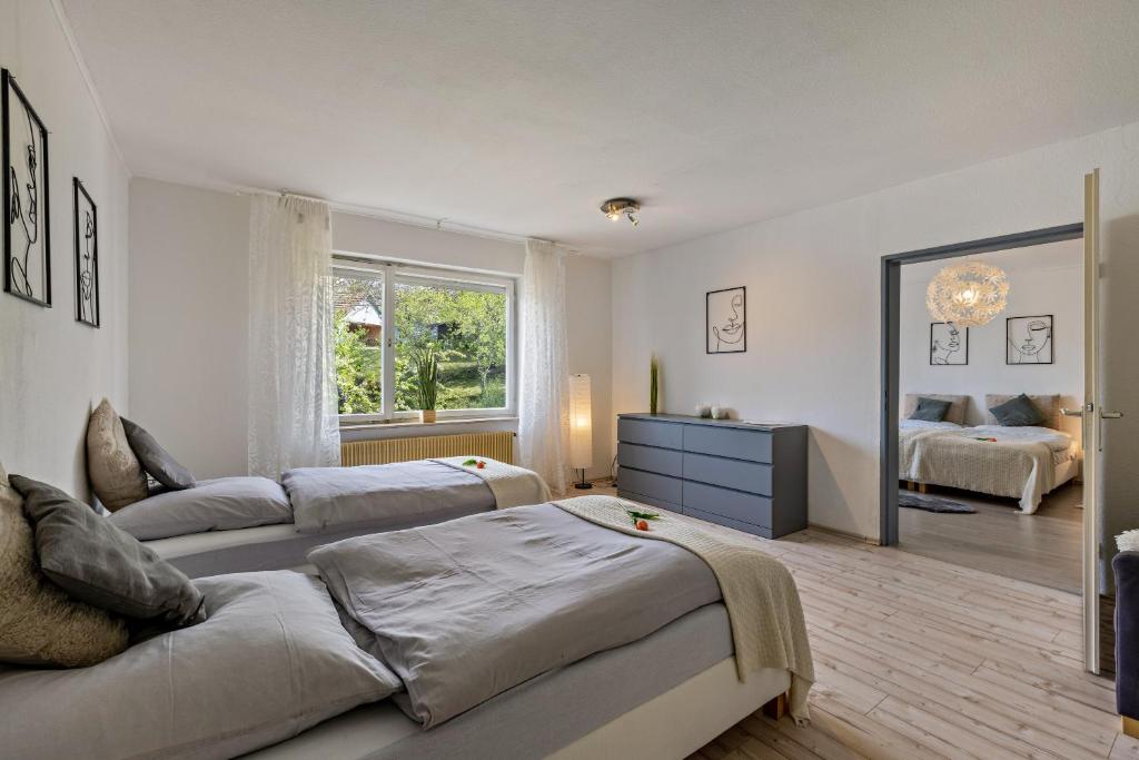 Postel nebo postele na pokoji v ubytování Apartment Alb Glück 1