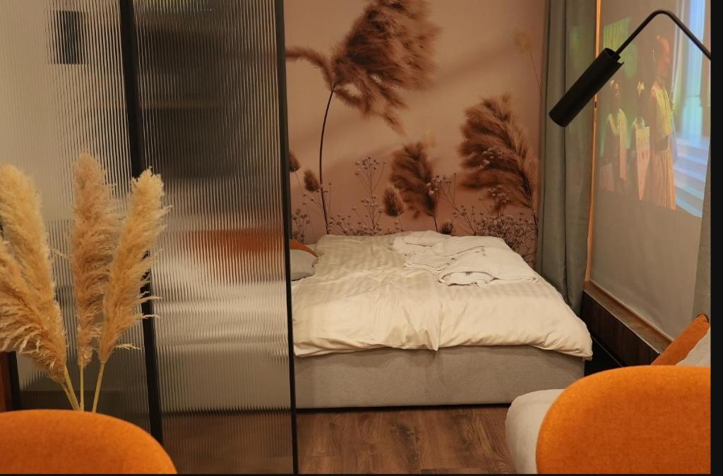 Postel nebo postele na pokoji v ubytování SkySpa Apartments - апартаменти з джакузі на терасі з видом на Печерськ