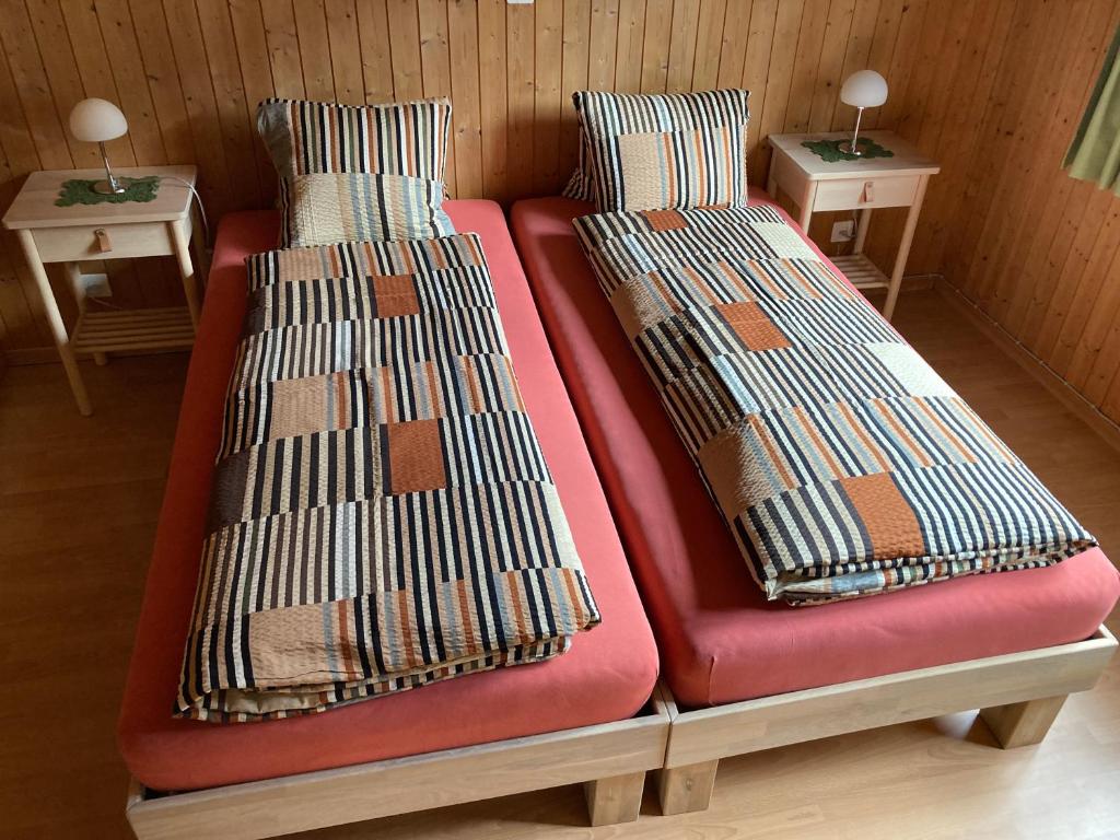 Postel nebo postele na pokoji v ubytování Tgea sulagliva