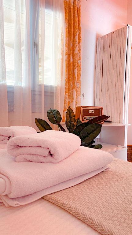 Postel nebo postele na pokoji v ubytování SİSU ALAÇATI OTEL