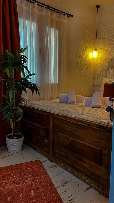 Postel nebo postele na pokoji v ubytování SİSU ALAÇATI OTEL