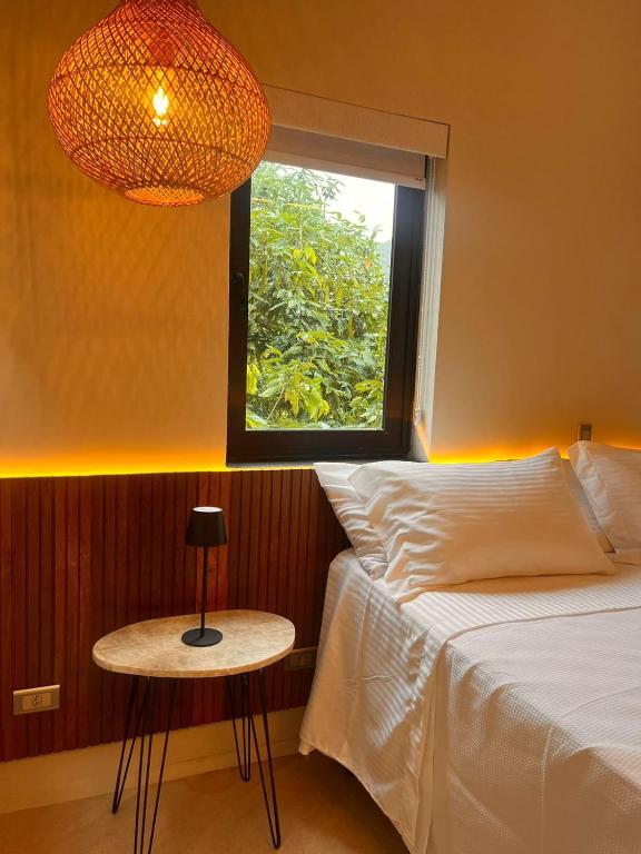 Cama ou camas em um quarto em Pousada Yamandu - Piscinas Aquecidas
