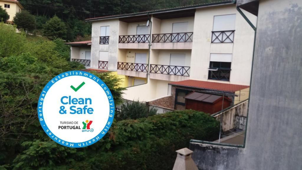 a sign for a clean and safe apartment building at Gerês River - Apartamento na Natureza in Geres