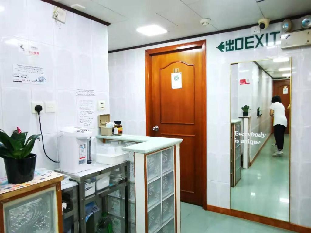 Kuchyň nebo kuchyňský kout v ubytování New Peking Guest House