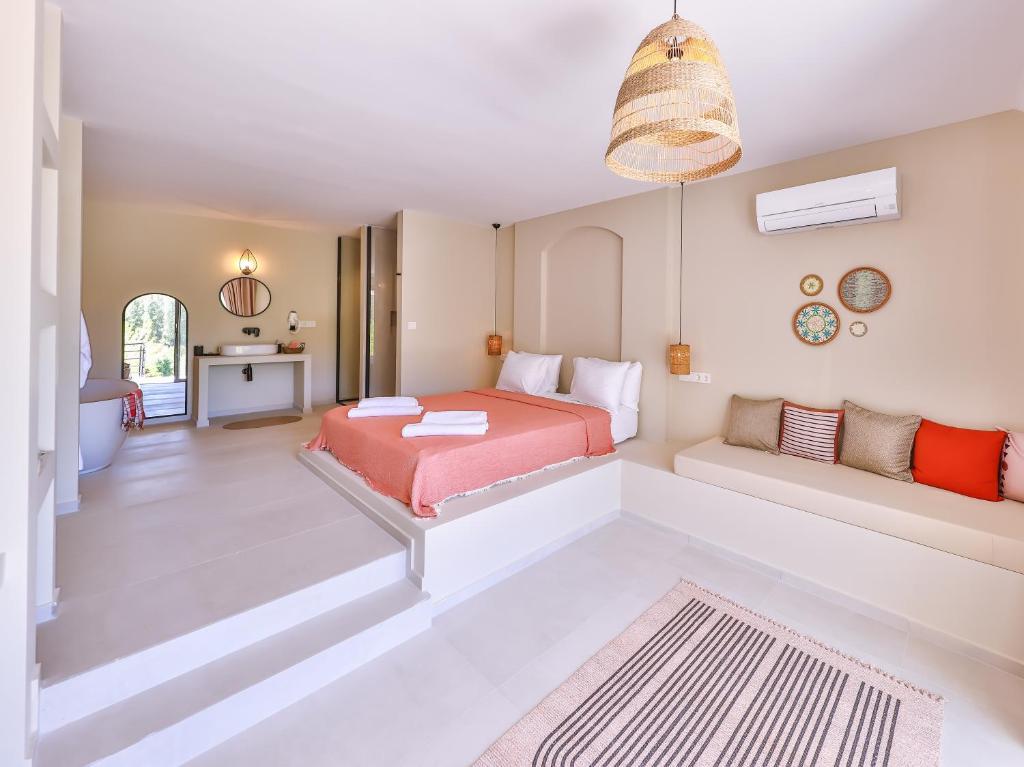 Postel nebo postele na pokoji v ubytování Kairos Hotel