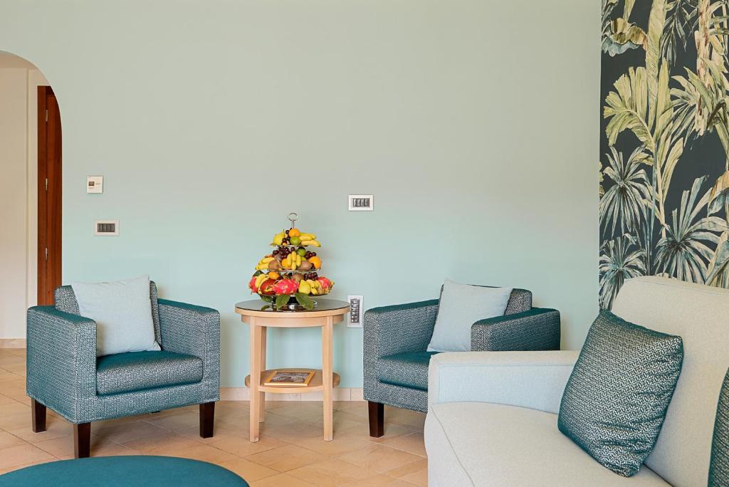 Ein Sitzbereich in der Unterkunft Park Hotel Argento
