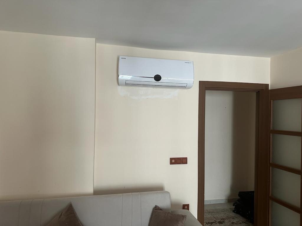 a room with a air conditioner on the wall at new flat in Mugla