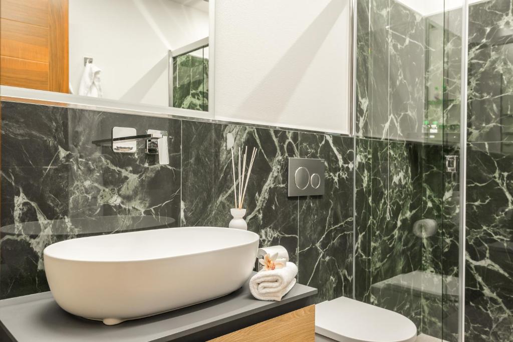 Ein Badezimmer in der Unterkunft Park Hotel Argento