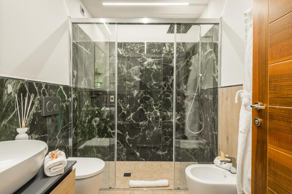 Ein Badezimmer in der Unterkunft Park Hotel Argento