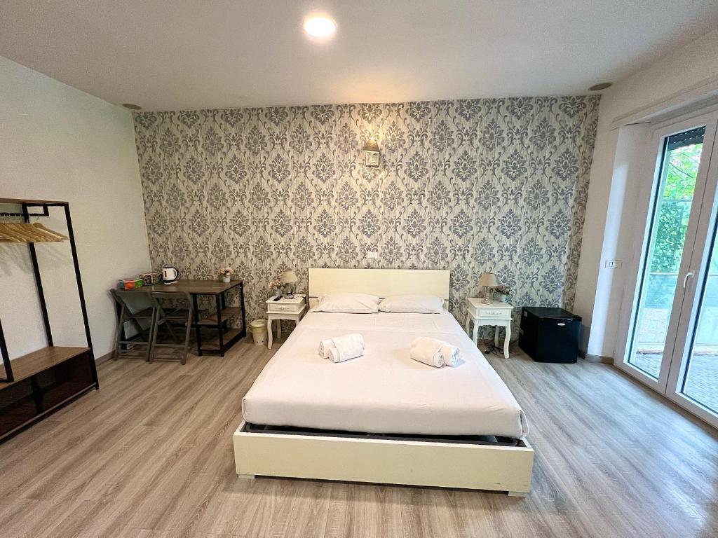 A bed or beds in a room at A Quattro Passi Da