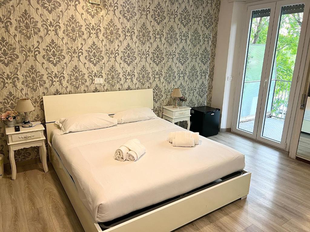A bed or beds in a room at A Quattro Passi Da