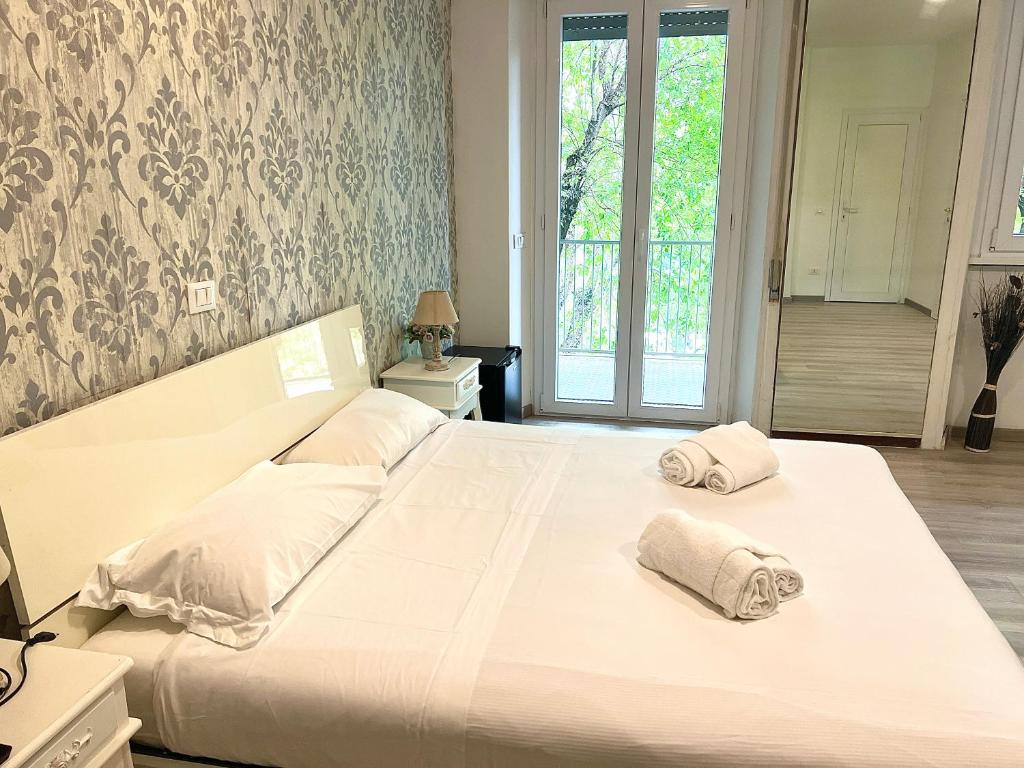 A bed or beds in a room at A Quattro Passi Da