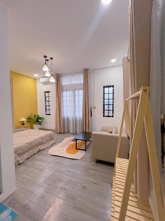 Postel nebo postele na pokoji v ubytování Neko Homestay Hue