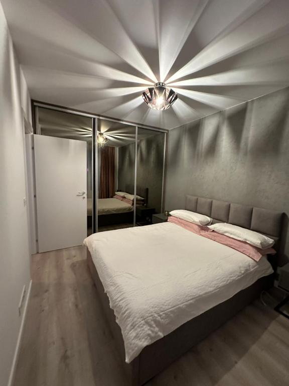 Cama o camas de una habitación en The Sea Escape Apartment