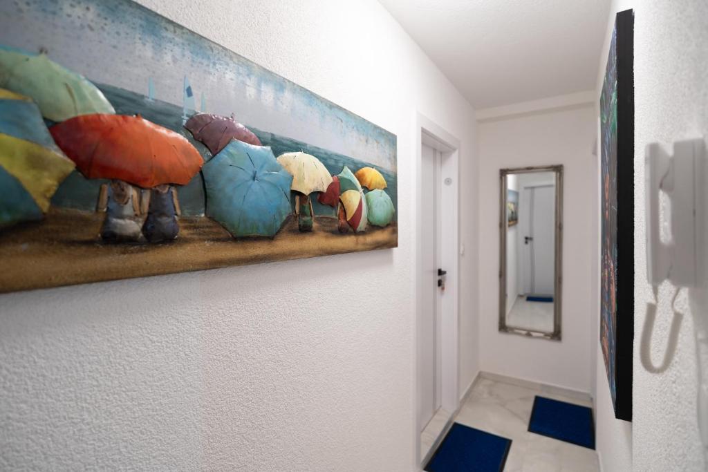 TV a/nebo společenská místnost v ubytování CityHeart-Rooms