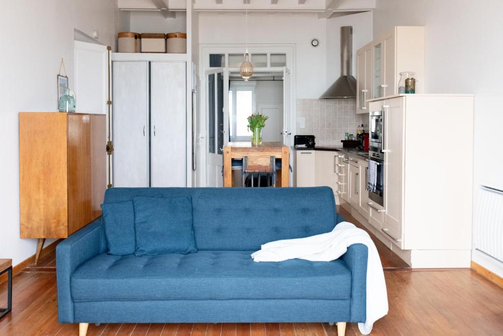 Kuchyňa alebo kuchynka v ubytovaní La Découverte, appartement front de mer Mers