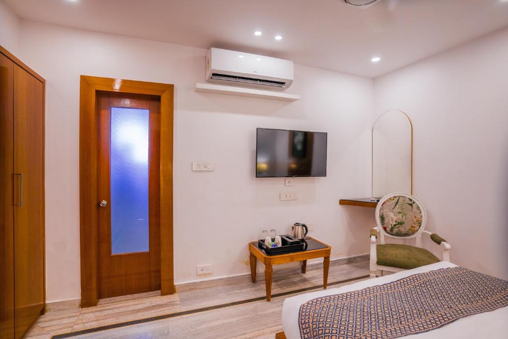 TV a/nebo společenská místnost v ubytování The Mohua - A Boutique Hotel