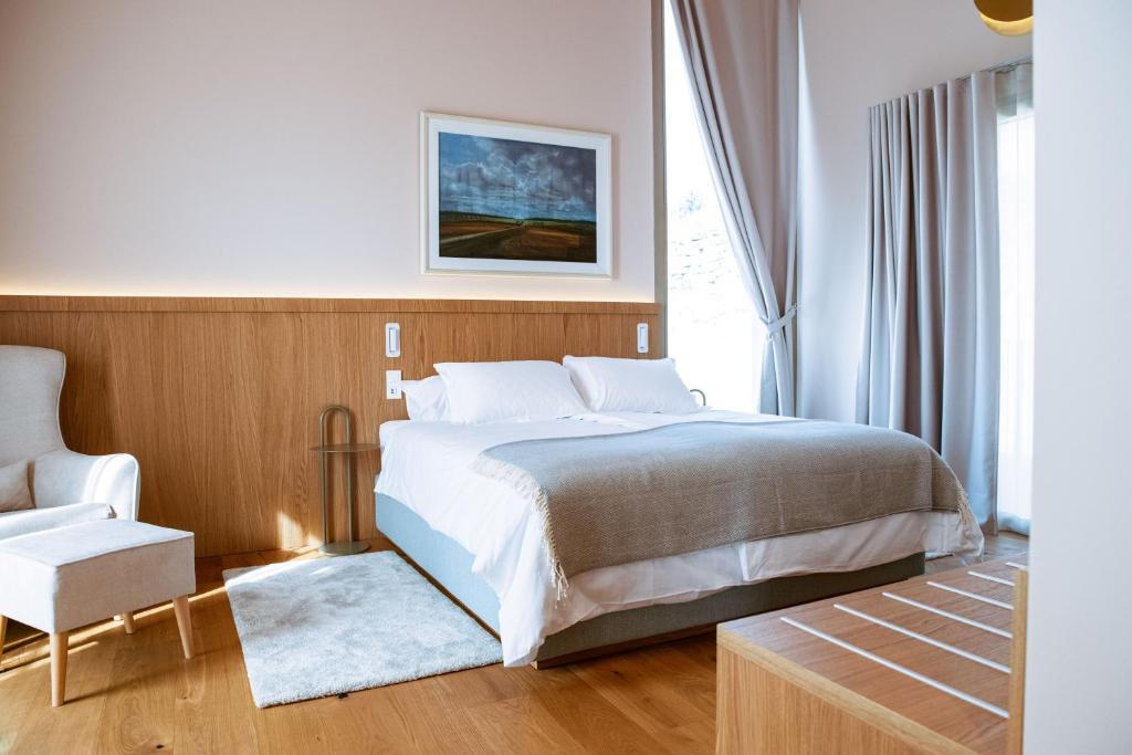 Postel nebo postele na pokoji v ubytování Posestvo Ščurek wine