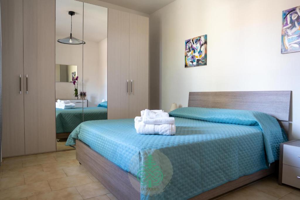 A bed or beds in a room at IL CEDRO