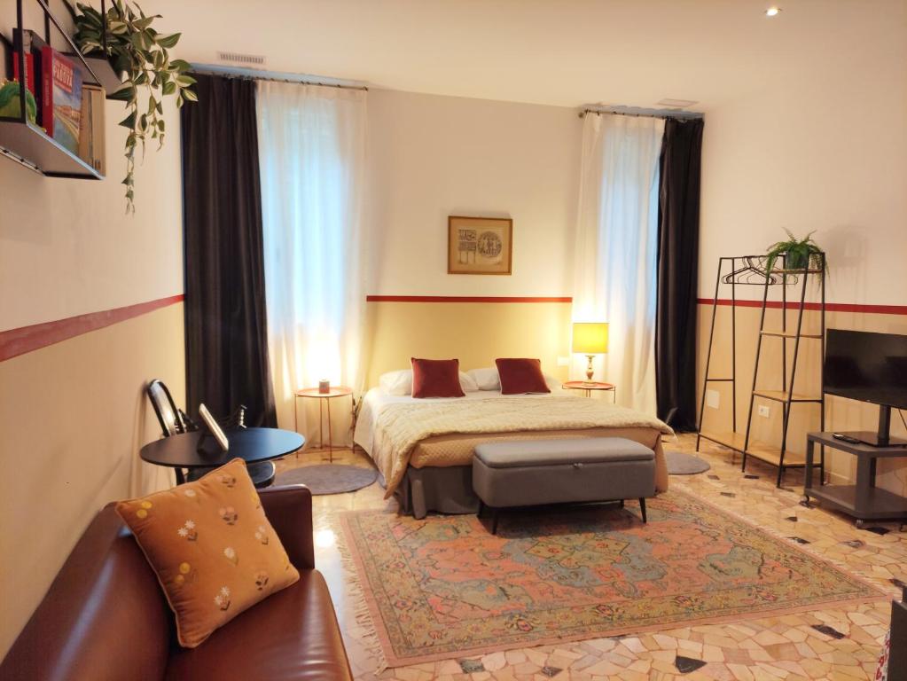 Ένα ή περισσότερα κρεβάτια σε δωμάτιο στο Loft Loggia al Santo