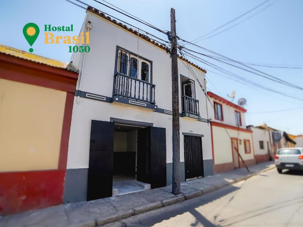 a building on the side of a street at Hostal Brasil 1050 in La Serena