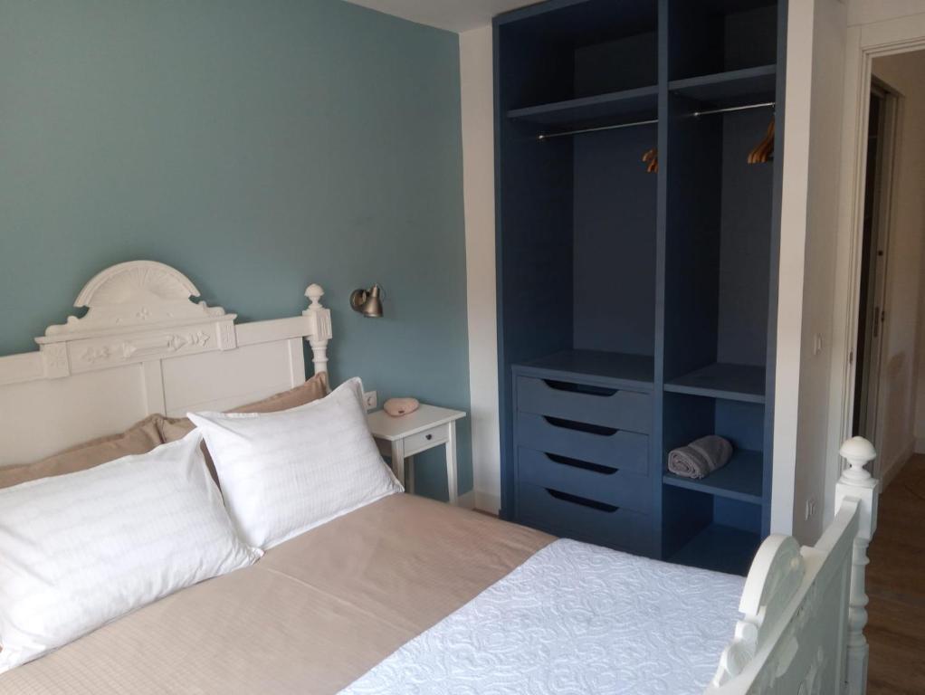 Postel nebo postele na pokoji v ubytování Com a casa
