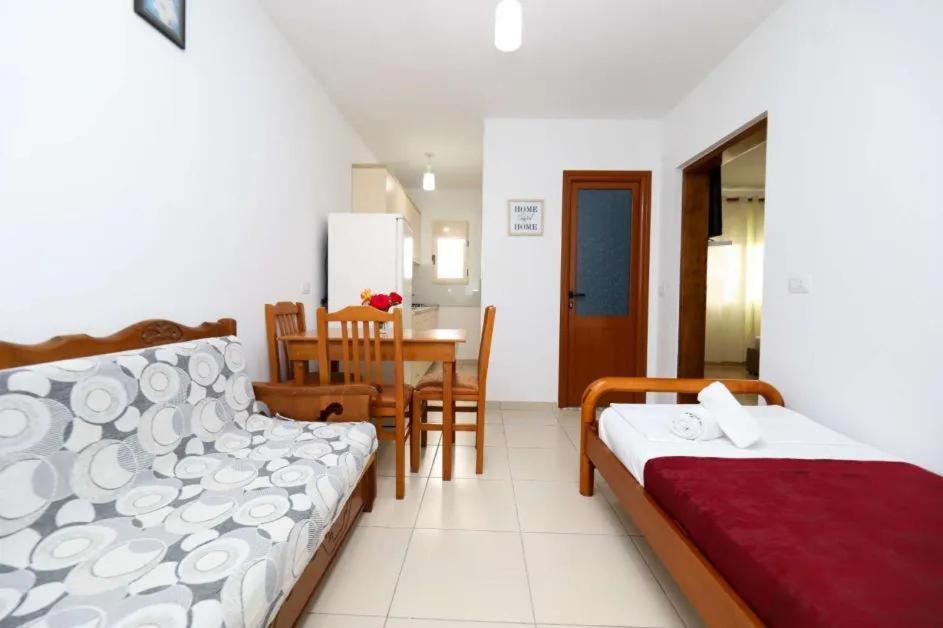 Postel nebo postele na pokoji v ubytování Vila Agolli