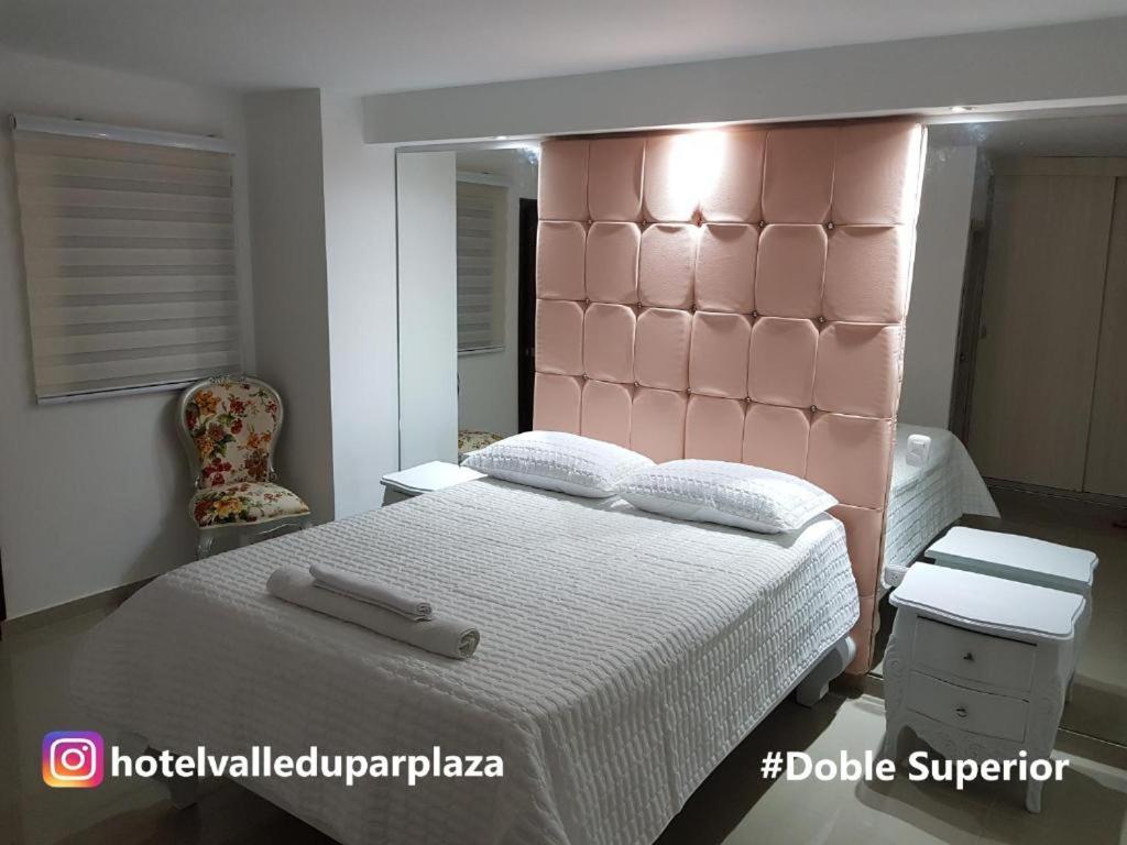 Una cama o camas en una habitación de Hotel Valledupar Plaza