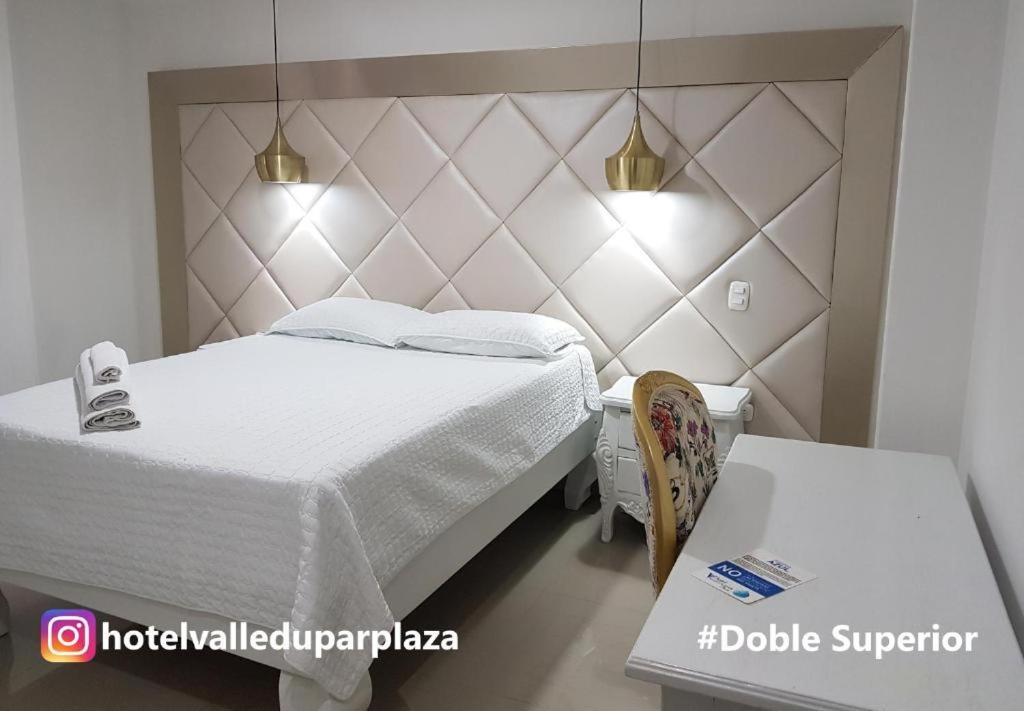 Una cama o camas en una habitación de Hotel Valledupar Plaza