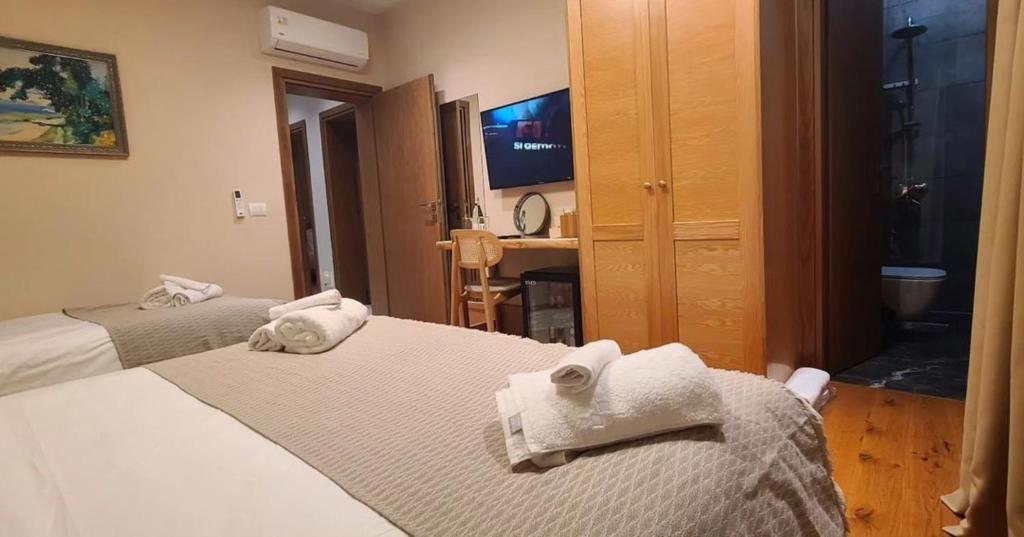 Postel nebo postele na pokoji v ubytování Velar Hotel Boutique