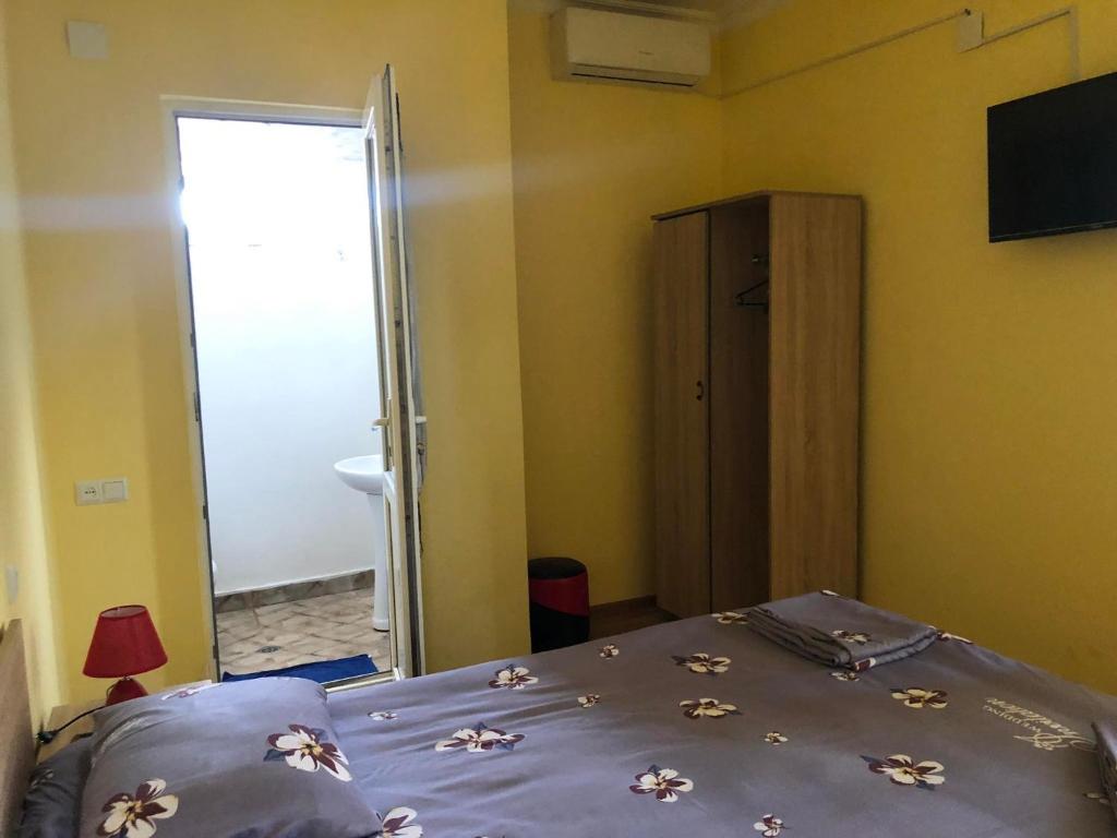 Postel nebo postele na pokoji v ubytování Отел Нана