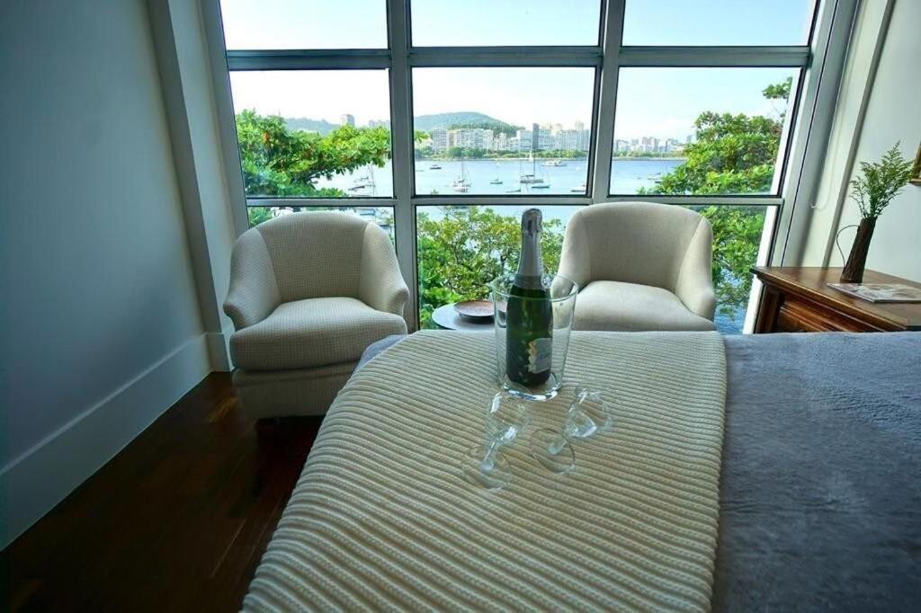 Гостиная зона в Apartamento vista mar e vista pão de açúcar