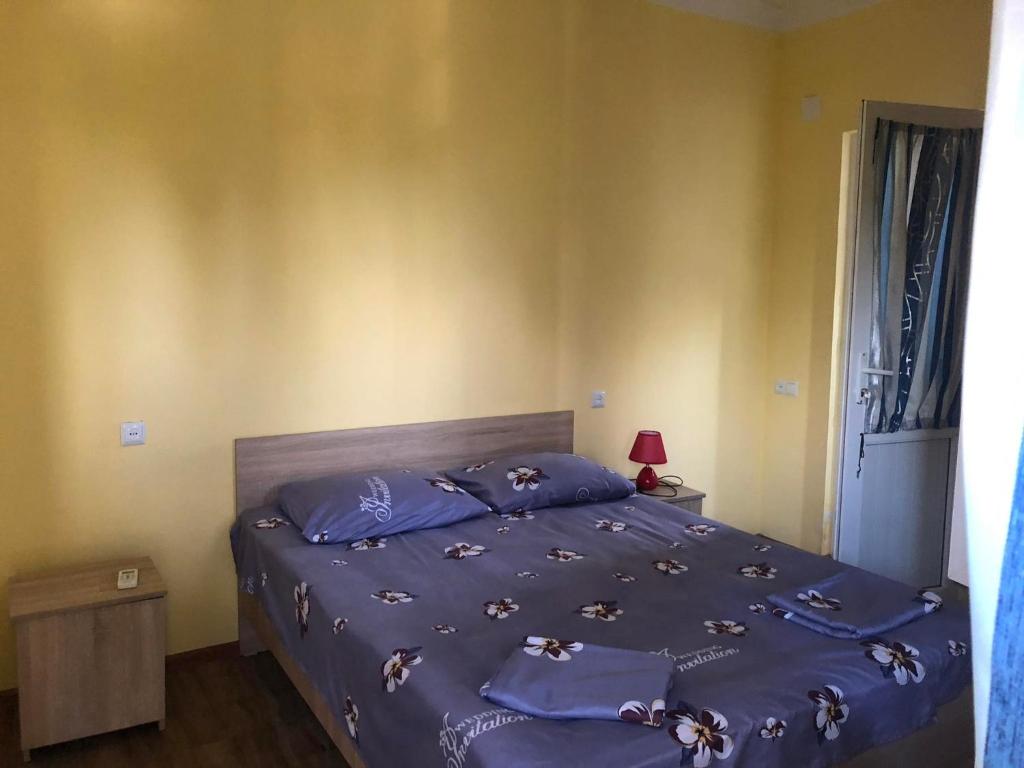 Postel nebo postele na pokoji v ubytování Отел Нана