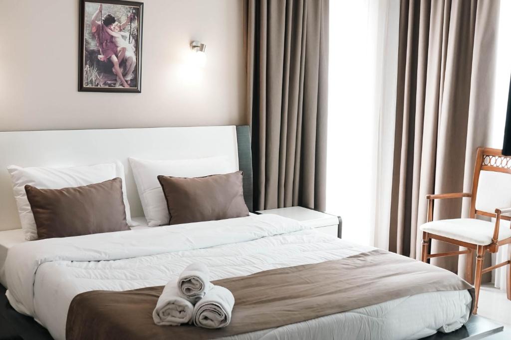 Postel nebo postele na pokoji v ubytování Hotel Kristal