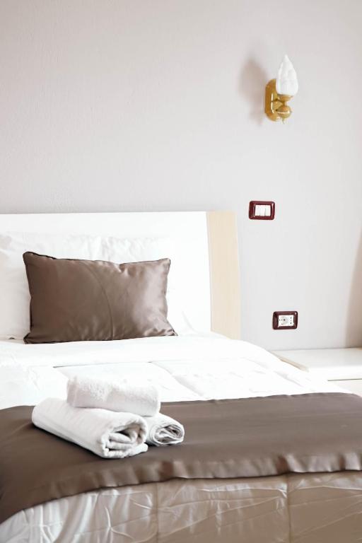 Postel nebo postele na pokoji v ubytování Hotel Kristal