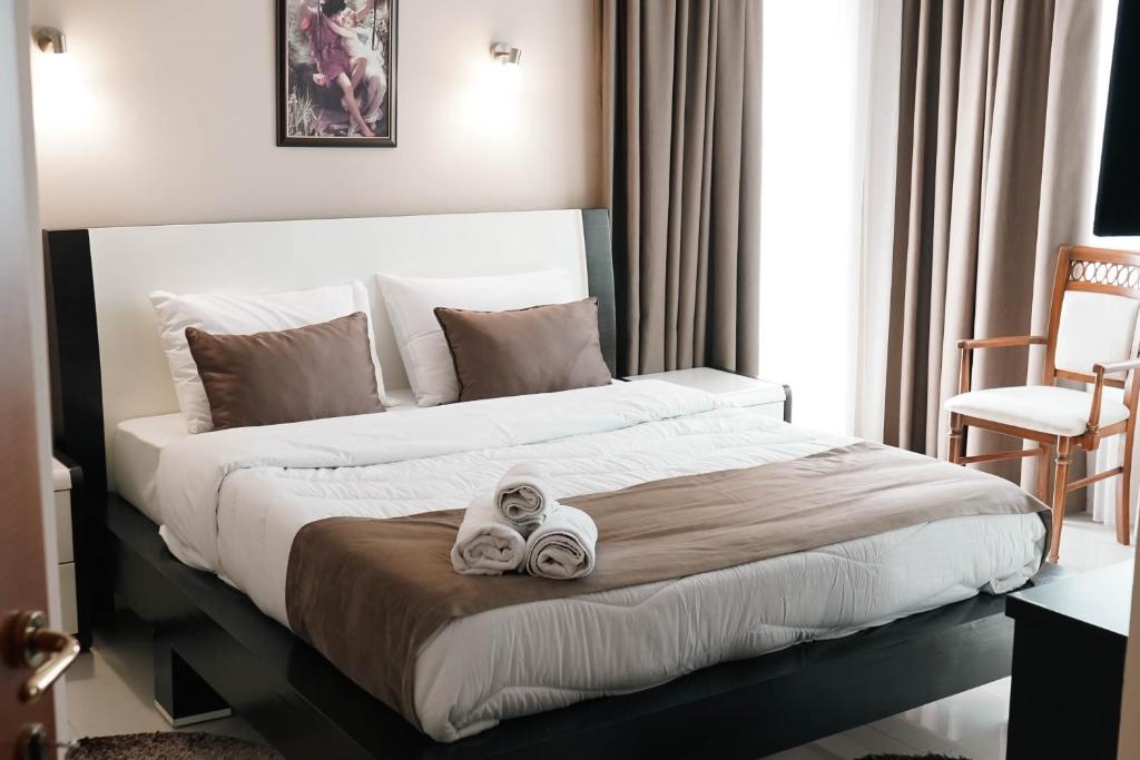Postel nebo postele na pokoji v ubytování Hotel Kristal