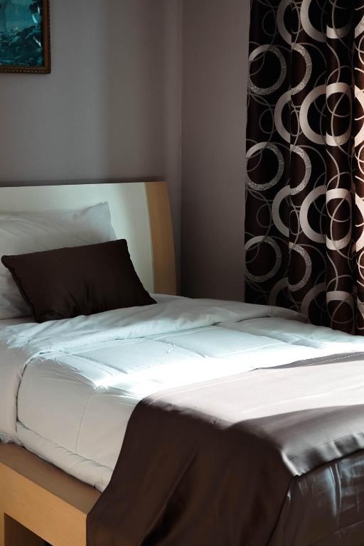Postel nebo postele na pokoji v ubytování Hotel Kristal