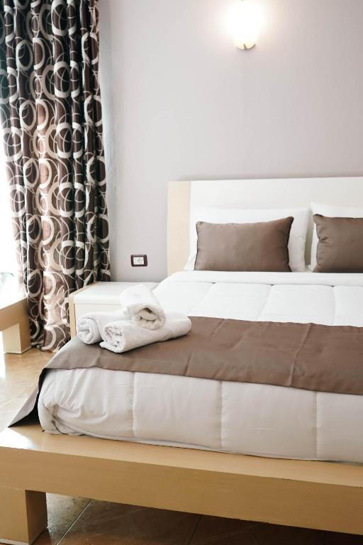 Postel nebo postele na pokoji v ubytování Hotel Kristal