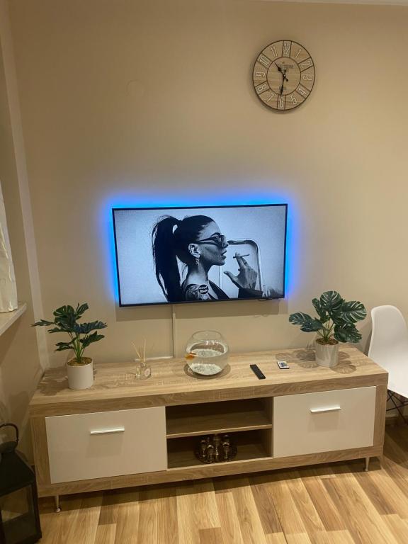 a living room with a flat screen tv on a wall at MVP59 in Alexandroupoli