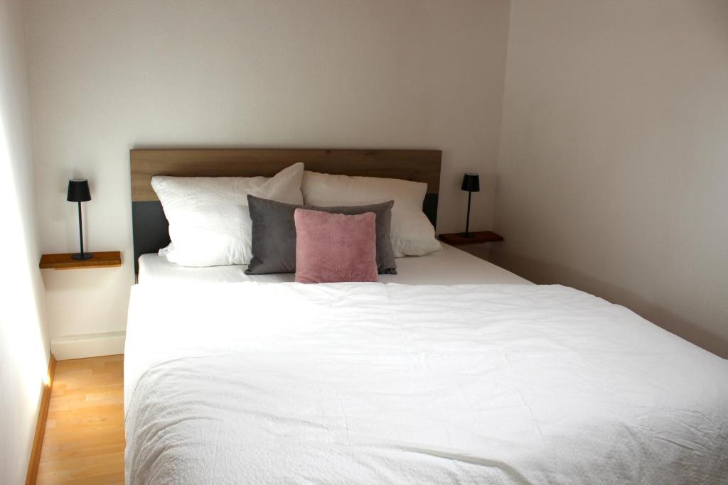 Postel nebo postele na pokoji v ubytování Ferienwohnung Woidblick