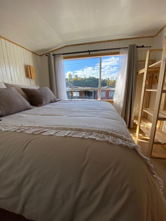 Postel nebo postele na pokoji v ubytování Refugio Ballena Hostel