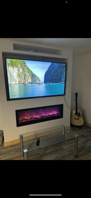 TV a/nebo společenská místnost v ubytování Pringle cottage